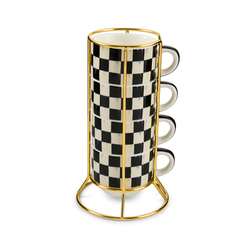 Four black and white checkered stoneware cappuccino cups stacked in a gold-tone metal wire stand.