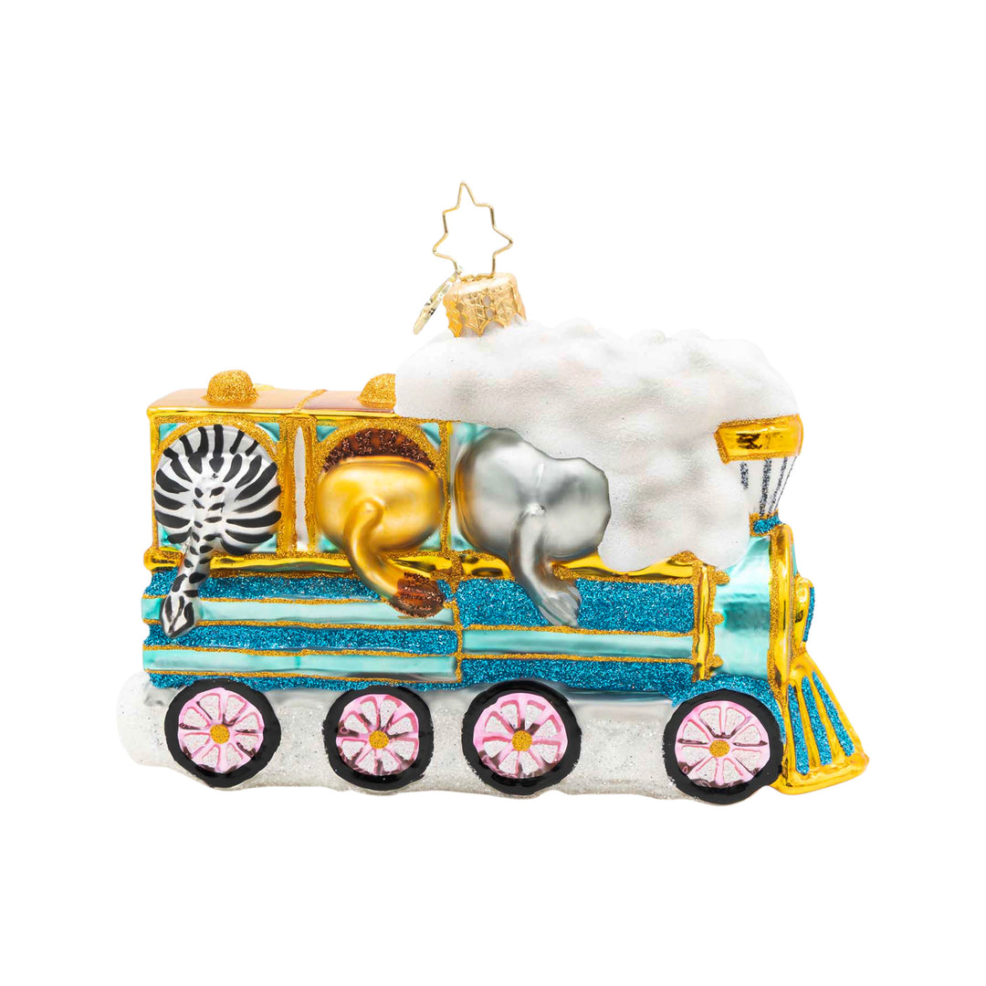 Glass train ornament with zebra, lion, and elephant passengers and glittery blue and gold details.