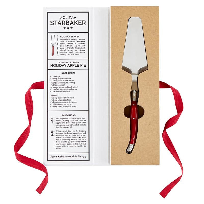Red handled stainless steel dessert server packaged in a gift book box with recipe.