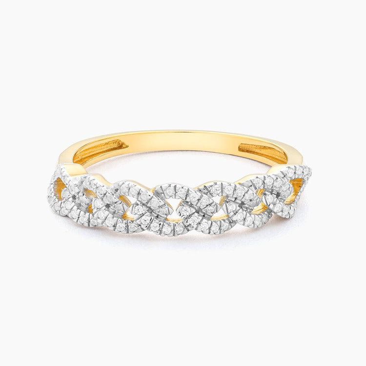 Stackable ring with a braided texture in gold-tone metal featuring an embedded flower accent.