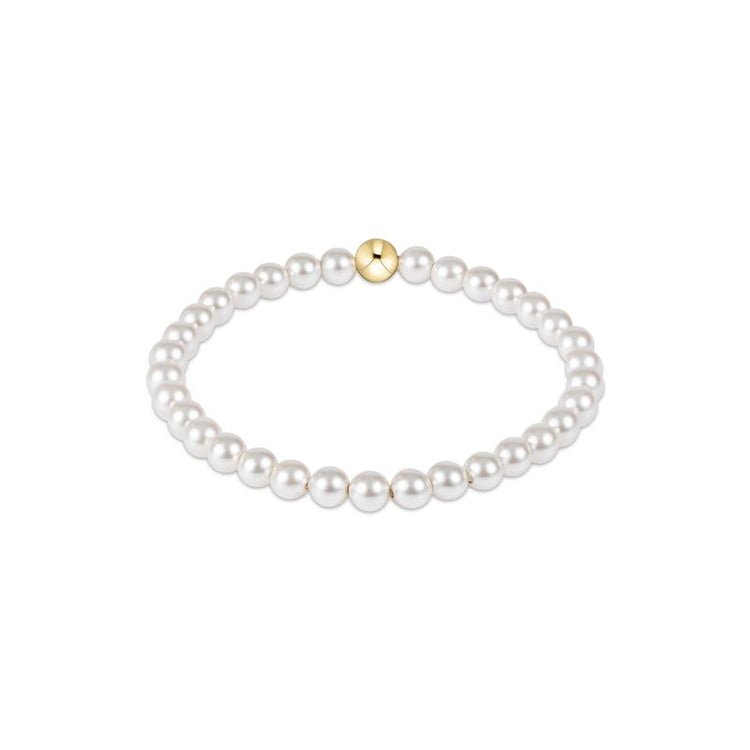 Classic Pearl 5mm Bead Bracelet featuring white crystal pearls and a single gold bead.