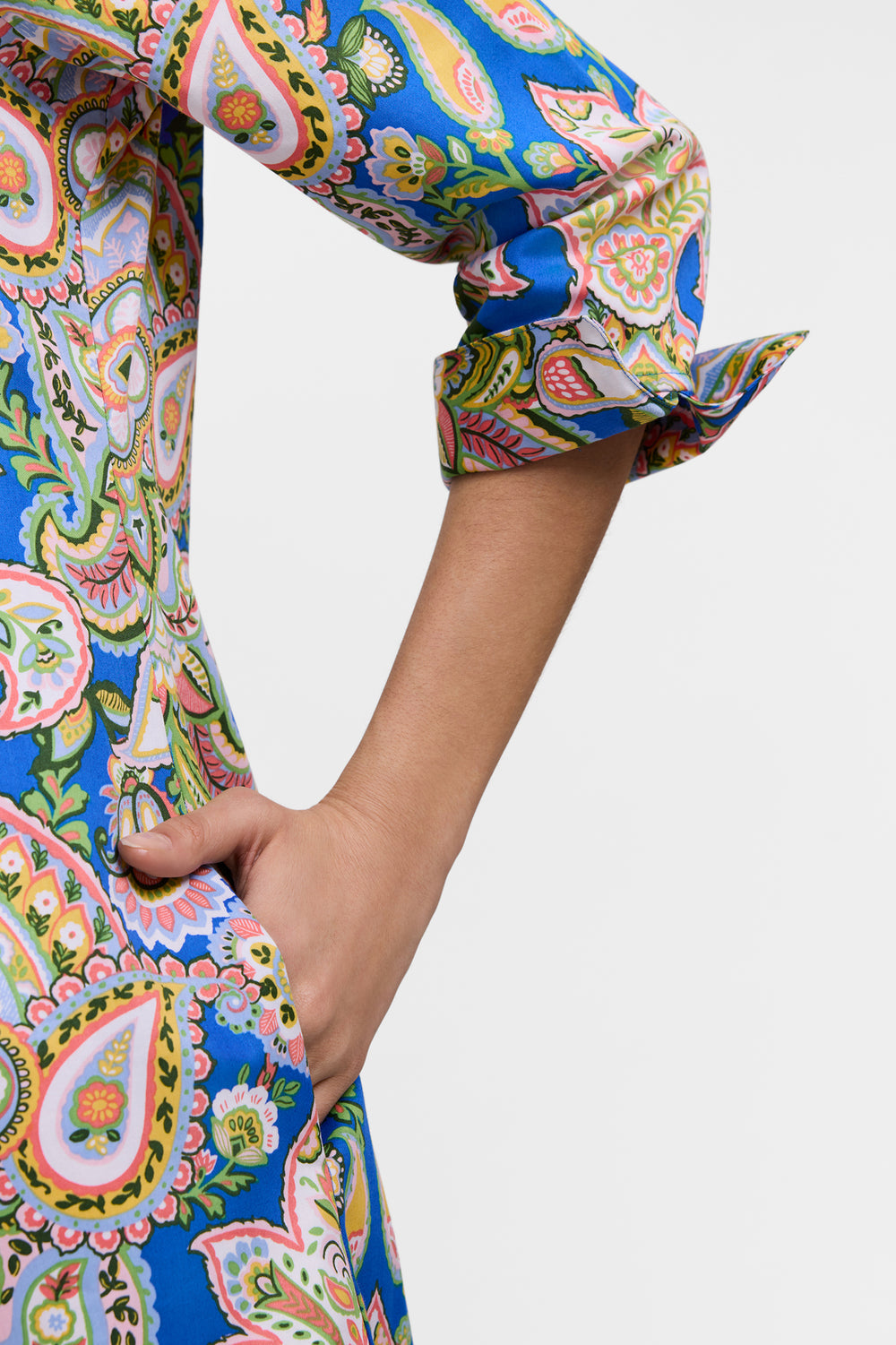 Relaxed fit Tammy Garden Paisley dress in floral print with V-neck, three-quarter sleeves, and side slit hem.
