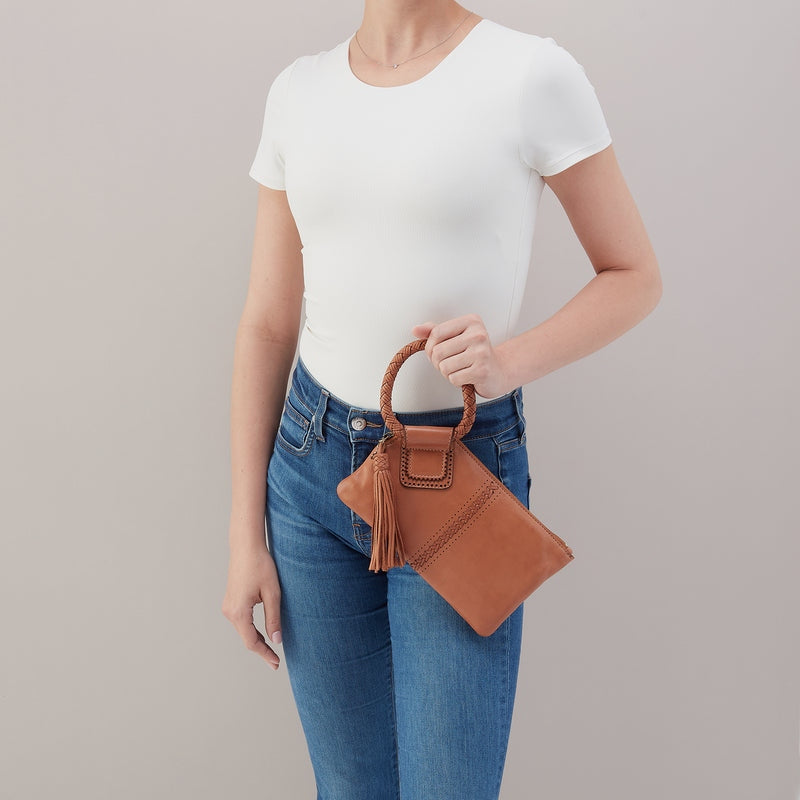 Sable Harvest Wheat leather wristlet with brass hardware