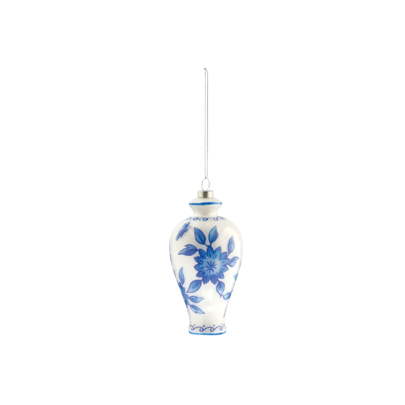 White glass ginger jar ornament with hand-painted blue floral motifs and a silver hanging string.