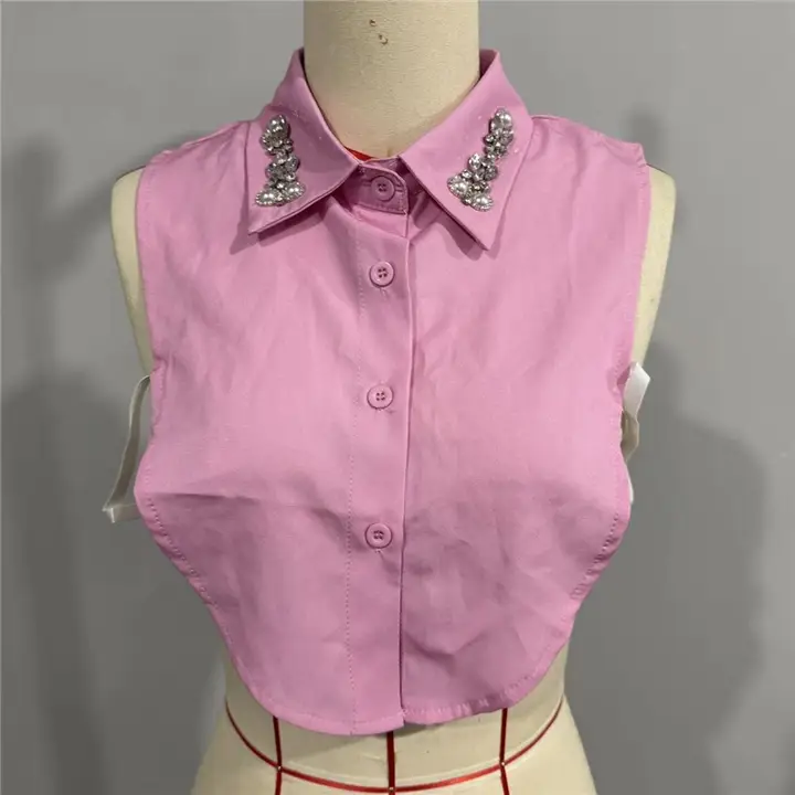 Pink detachable shirt collar with diamond-studded embellishments on the collar points.