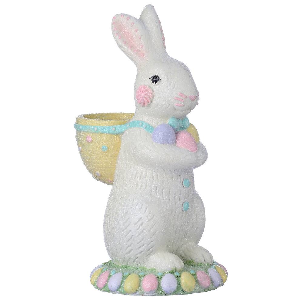 9-inch resin bunny figurine with sugared finish holding a small basket