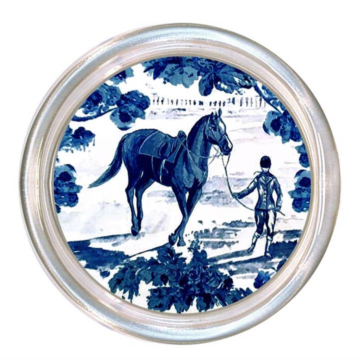Round glass coaster with a high rim to prevent spills and a black velvet back.