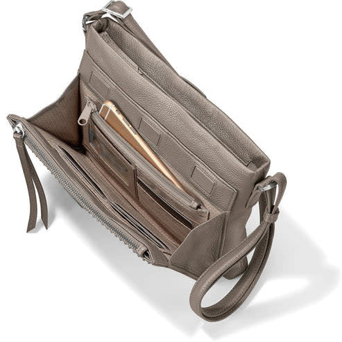 Zinc Pearl leather cross body organizer with nailhead studs, zippered compartments, and exterior pockets.