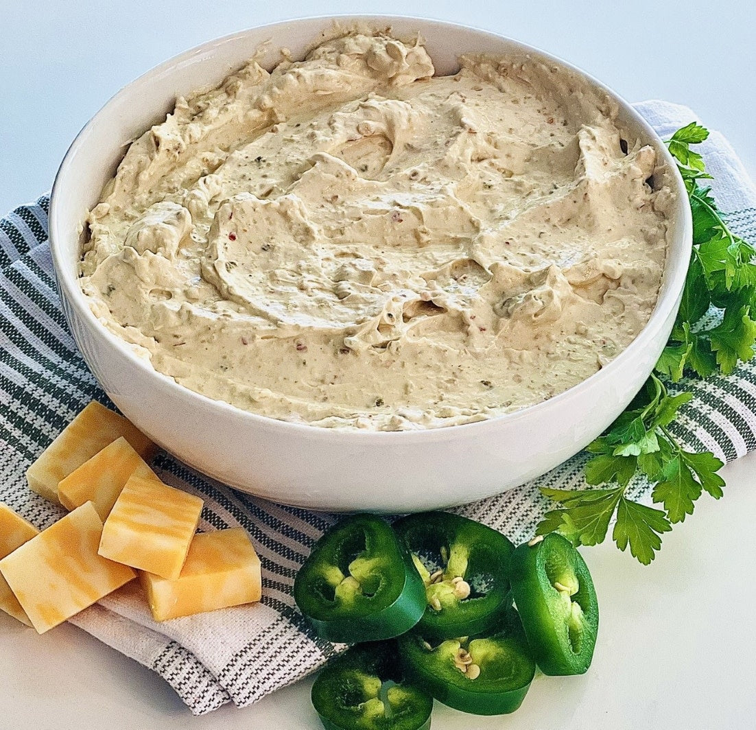 Jalapeño Cheddar Dip mix packet with red peppers visible on the front label.