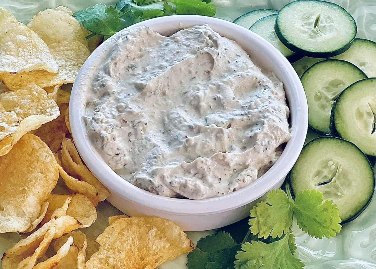 Jalapeño Ranch dip mix packet with green peppers on a white background