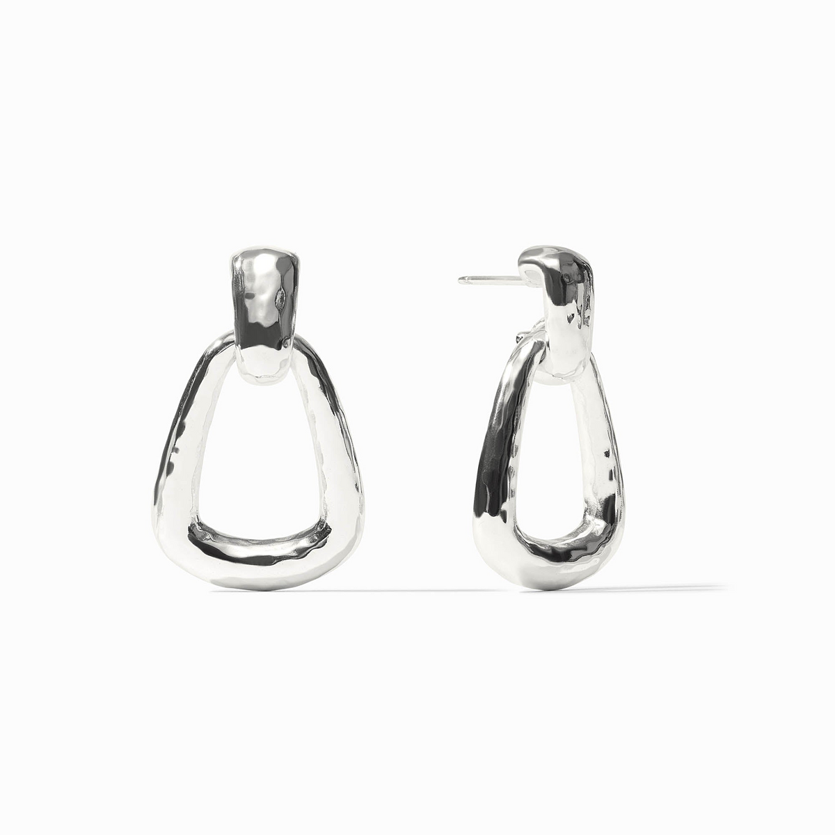 Pair of silver Sahara Demi Doorknocker Earrings with a hammered, organic finish.