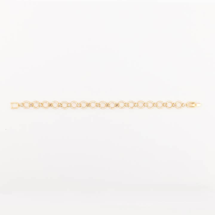Gold-tone Bracelet Tierney featuring a series of interlocking circular links with crystal accents.