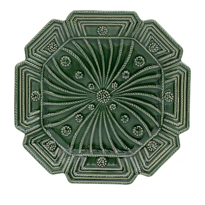 Set of four stoneware dessert plates in basil green with a subtle leaf pattern.