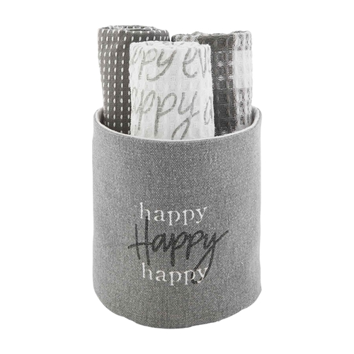Gray and white cotton towels with patterns rolled in a canvas bucket labeled Happy Everything.