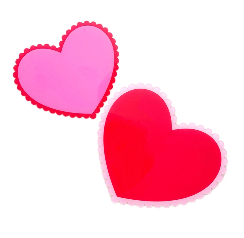 Scalloped heart-shaped serving tray with a natural wood finish.