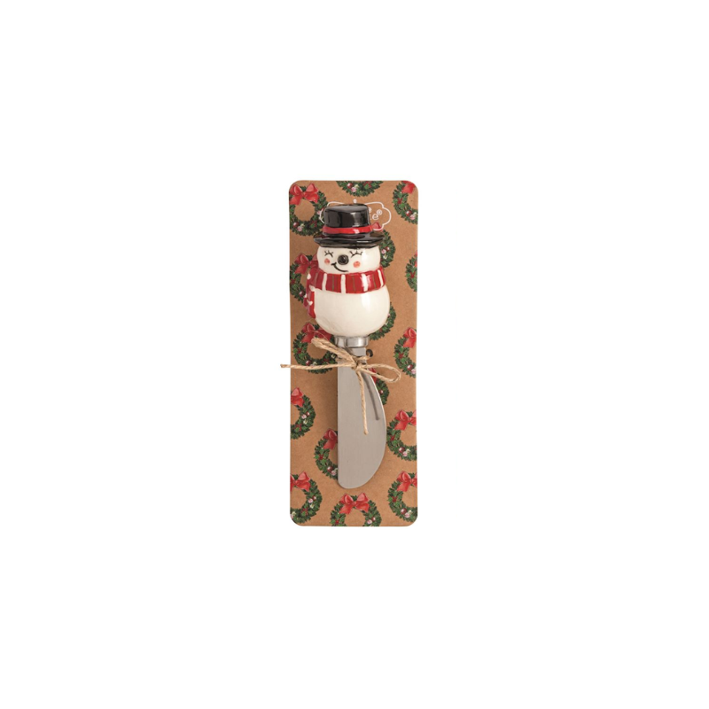 Snowman spreader with hand-painted stoneware handle and stainless steel blade on a display card.