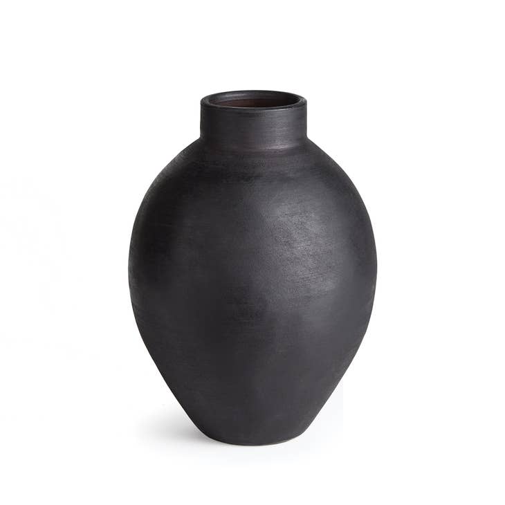 Small black ceramic vase with a simple cylindrical silhouette.