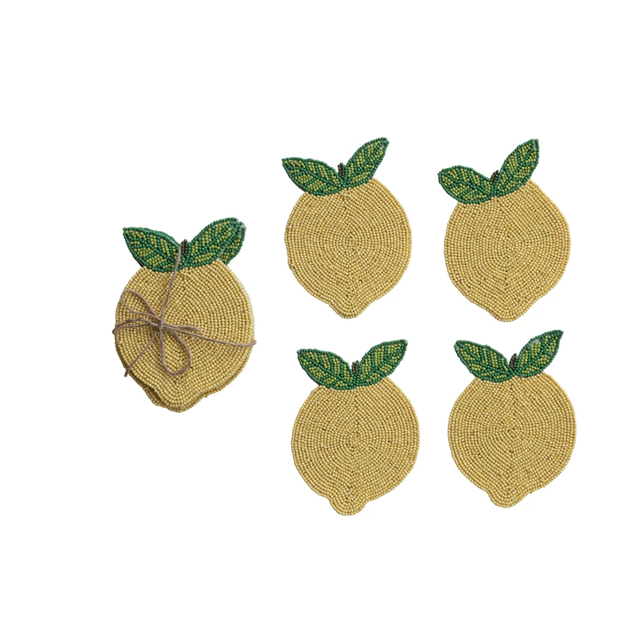 Set of handmade beaded lemon coasters tied with jute rope