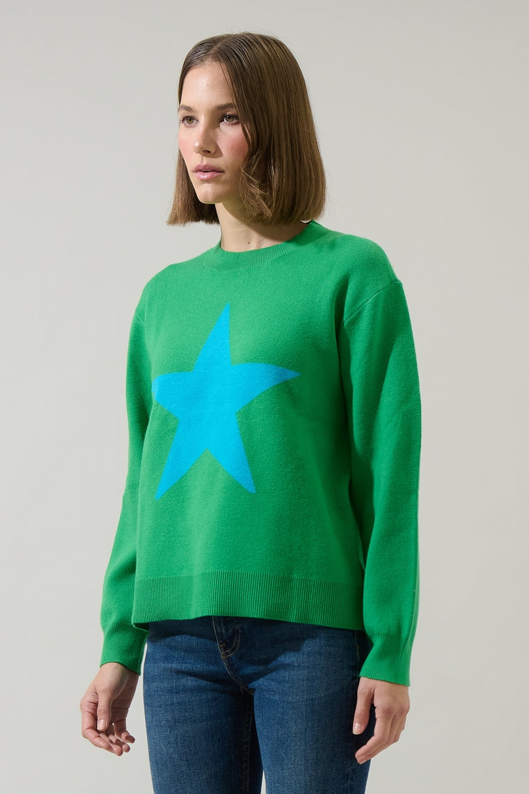 Green knit pull over sweater with blue star at center chest