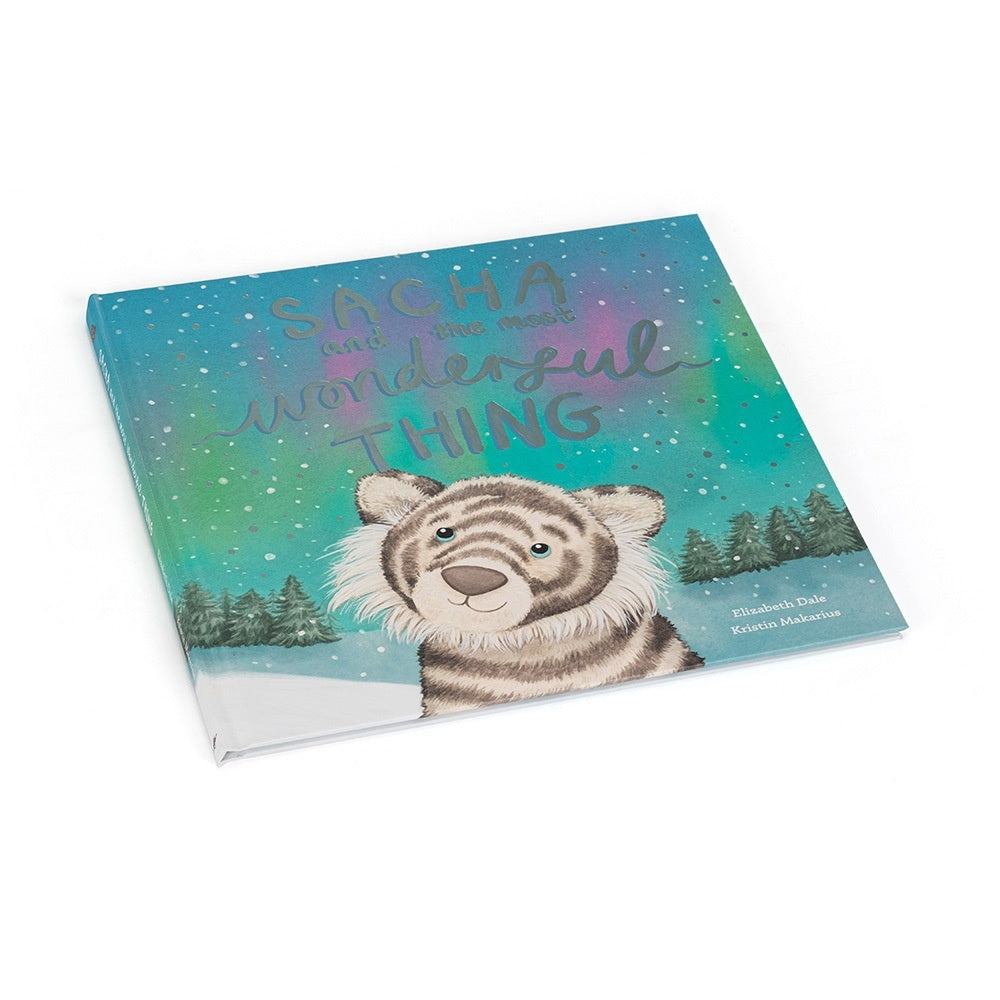 Hardcover children's book titled Sacha and the Most Wonderful Thing with a colorful illustrated cover featuring a character named Sacha.