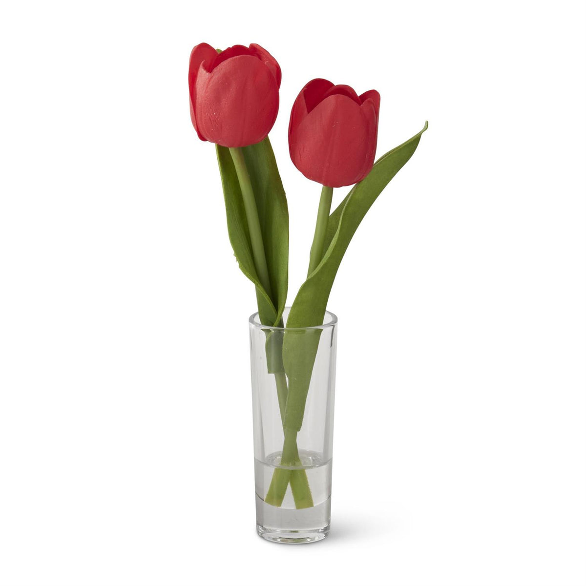 Glass vase holding double tulip arrangement with faux flowers in cream and green tones.