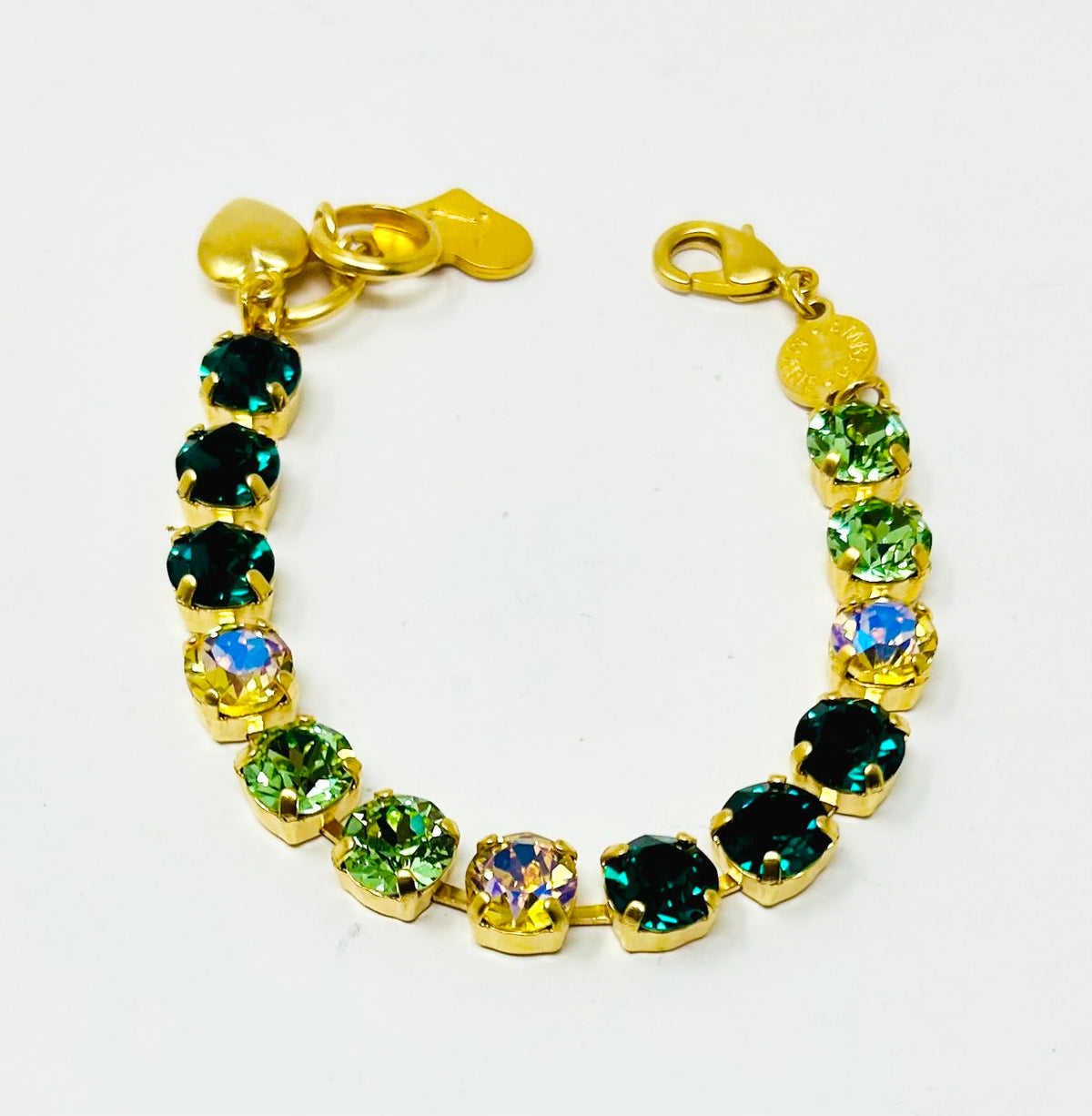 Gold classic bracelet with green and iridescent Czech crystals and a heart charm.