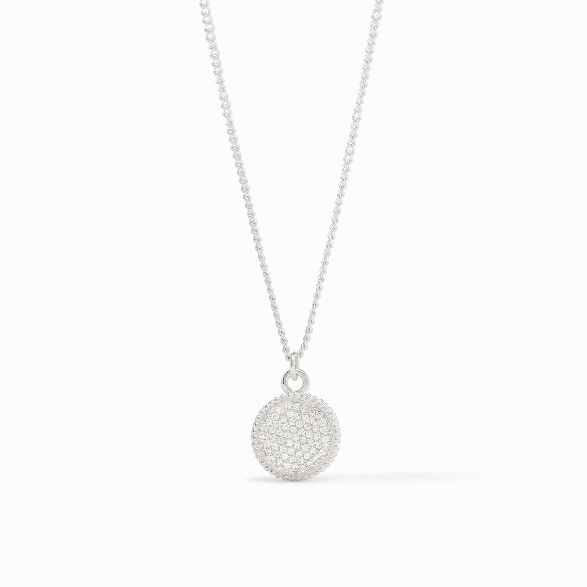 Fleur-de-Lis Solitaire Silver Necklace featuring a round, crystal-encrusted pendant on a fine chain.