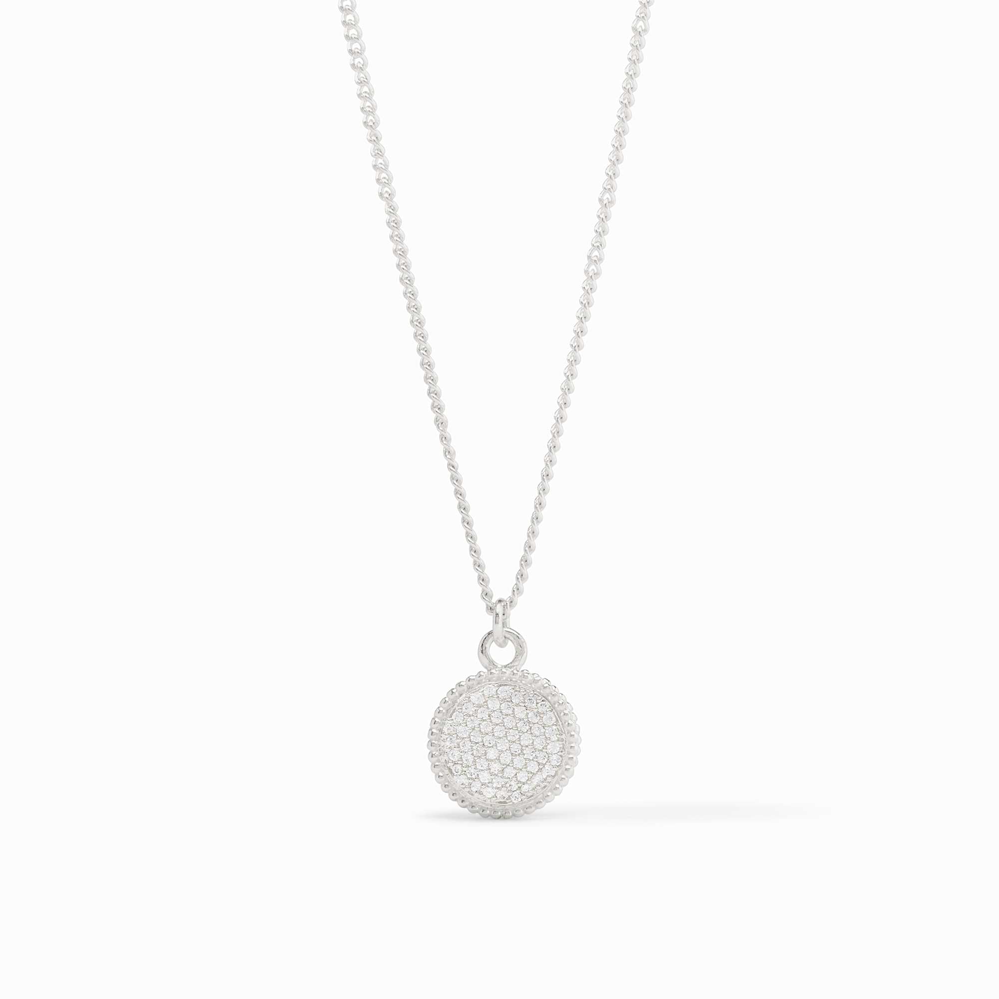 Fleur-de-Lis Solitaire Silver Necklace featuring a round, crystal-encrusted pendant on a fine chain.