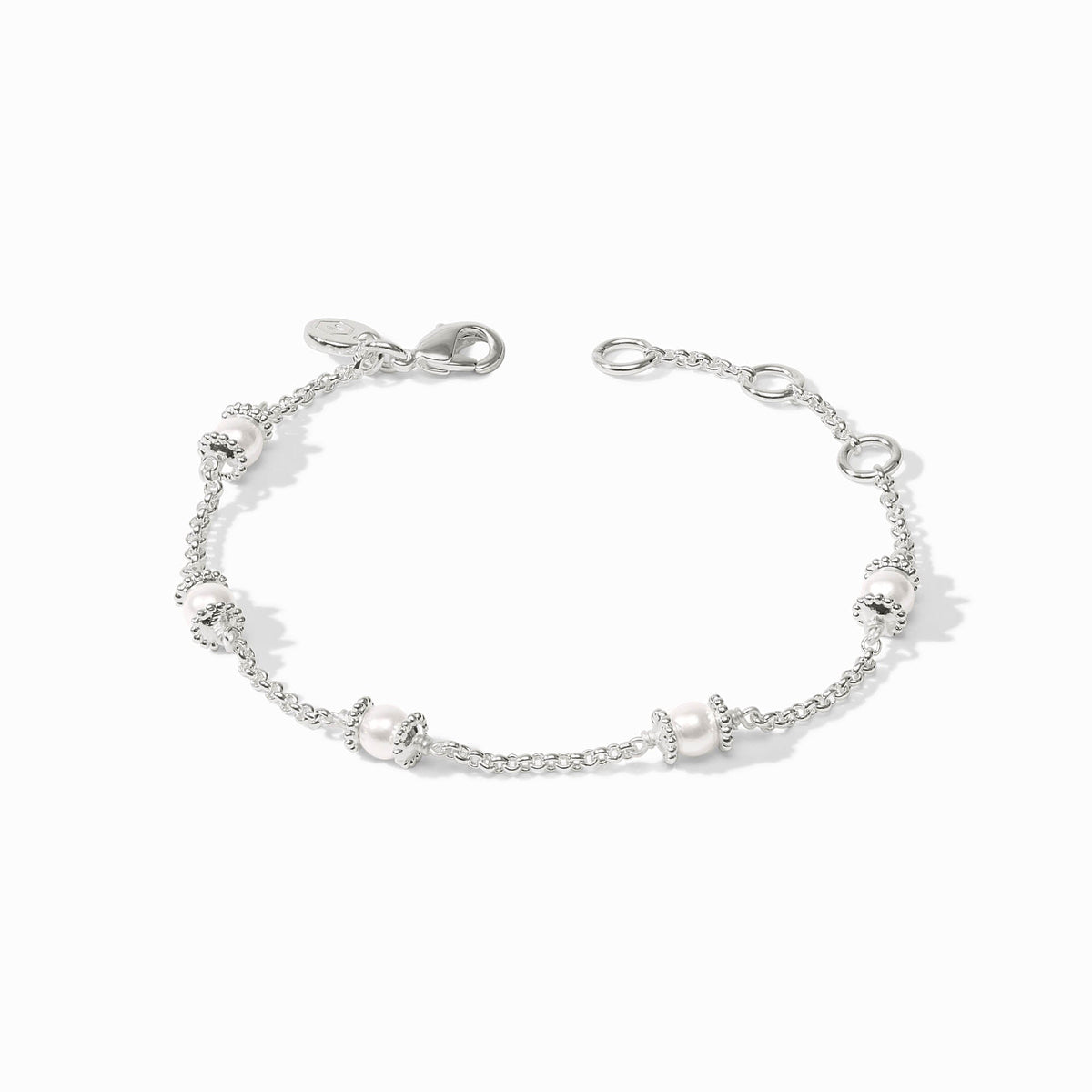 Adjustable silver plate delicate bracelet featuring a shell pearl with lobster clasp closure.