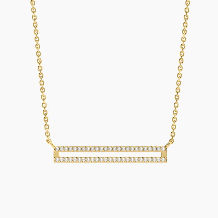 Gold-plated bar pendant necklace with two rows of small diamonds on a delicate chain.