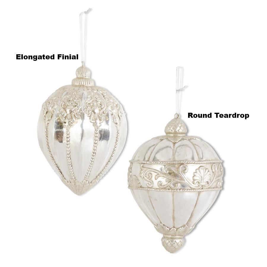 Silver glittered shatterproof finial ornaments in elongated finial and round teardrop styles.