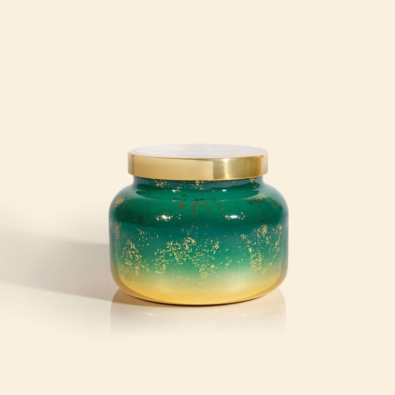Crystal Pine Glimmer Signature Jar Candle in a green and gold ombre glass jar with a gold lid.