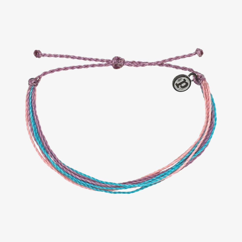 Handmade wax-coated adjustable bracelet in bright original color with a natural organic pattern.