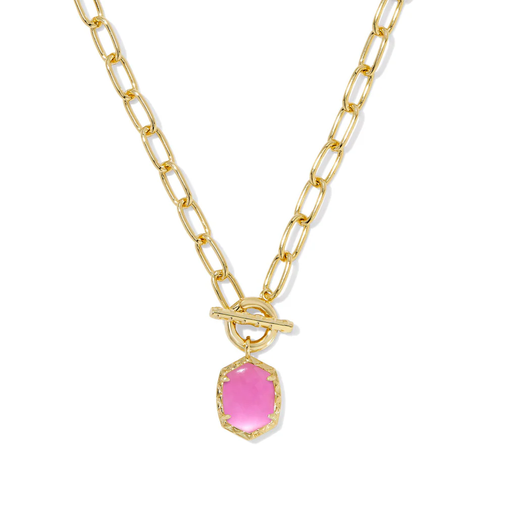 Daphne Link and Chain Necklace with a pink oval pendant on a gold paperclip chain with toggle clasp.