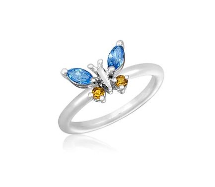 Silver stack ring with a butterfly design featuring blue marquise stones and small yellow accent stones.