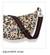 Spotted Love Swing Bag GWP in spotted print with adjustable strap and zipper pocket.