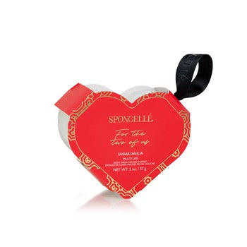 Daisy Collection heart-shaped body buffer sponge with Yuzu, Edelweiss, and Vetiver extracts.
