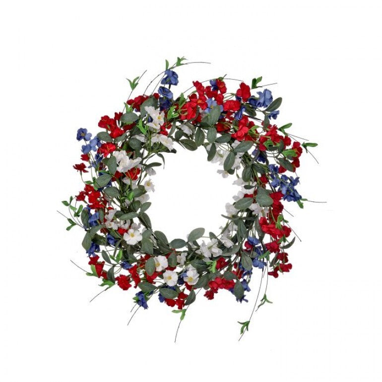 A round wooden wreath with a natural finish featuring small green leaves and pink flower accents.