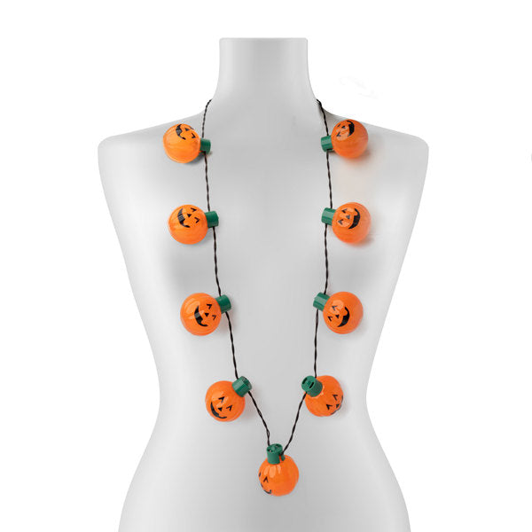 Lotsa Light Jumbo Flashing Halloween Necklace with nine orange jack-o'-lantern LED bulbs.