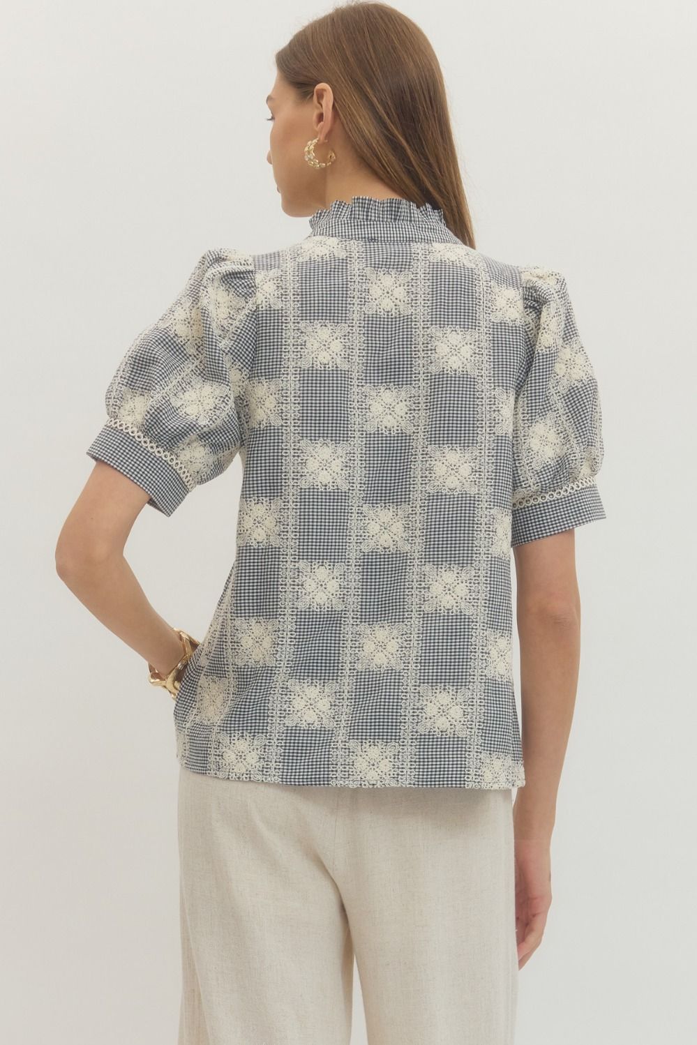 Amanda Gingham Puff Sleeve Top in white with black gingham pattern featuring unlined lightweight woven fabric.