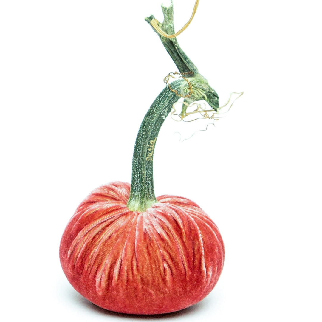 A 3-inch handmade red silk velvet pumpkin with a long, natural green stem.