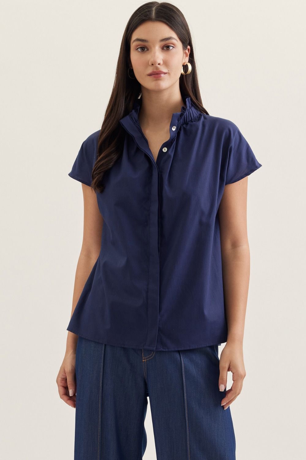 Aliana solid cap sleeve top in light beige with ruffled stand collar and button front closure