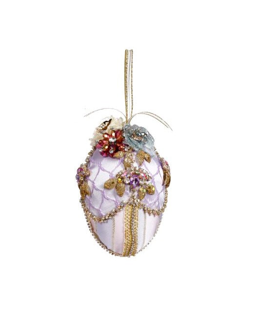 Six-inch fabric-covered foam Easter egg decorated with jewels and flowers on a ribbon hanger.