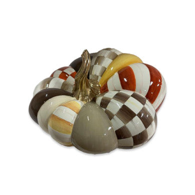 Large resin pumpkin with a patchwork leaf pattern in harvest colors.