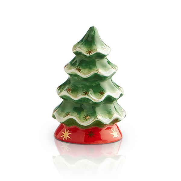 Ceramic Christmas tree figurine, green with gold star pattern on a red base.