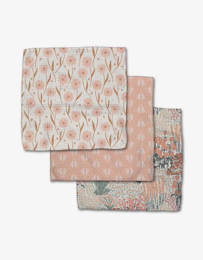 Set of three waffle weave dishcloths in recycled polyester with single-sided prints and hang loops.