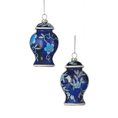 Two blue glass floral urn ornaments with light blue flower patterns and silver hanging strings.