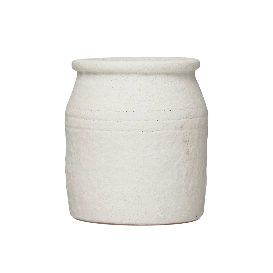 Round distressed terracotta crock with volcano finish