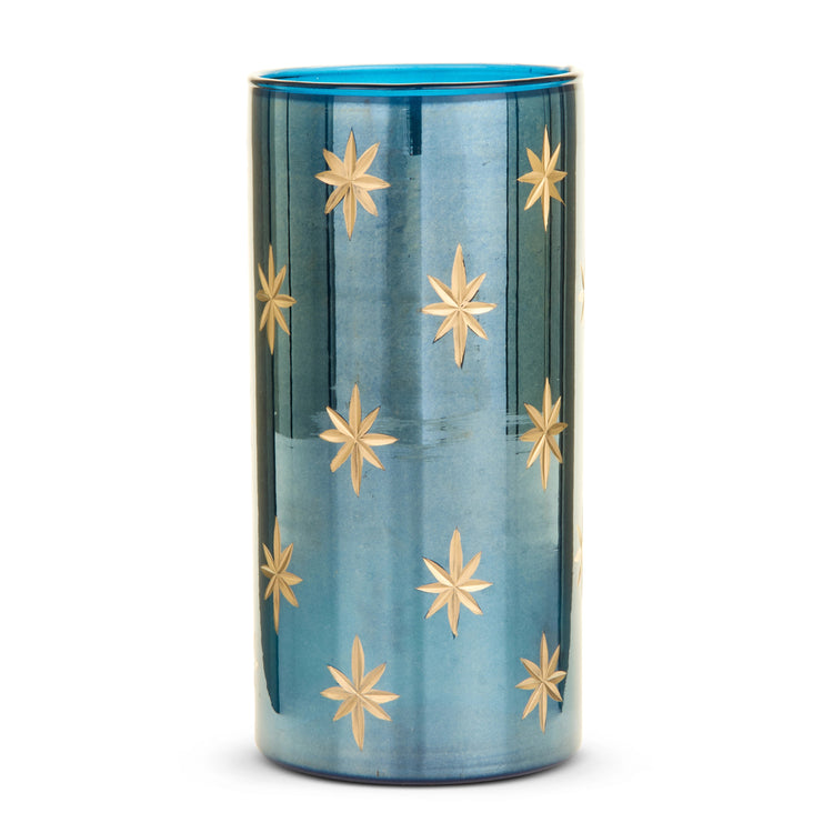 Cylindrical blue glass container with etched gold star patterns.