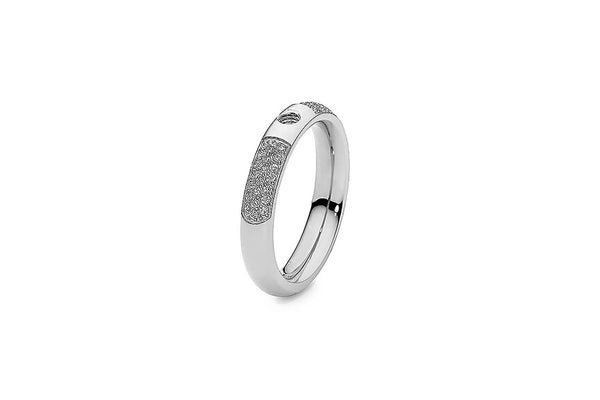Silver ring with pave diamond accents and a central oval cutout.